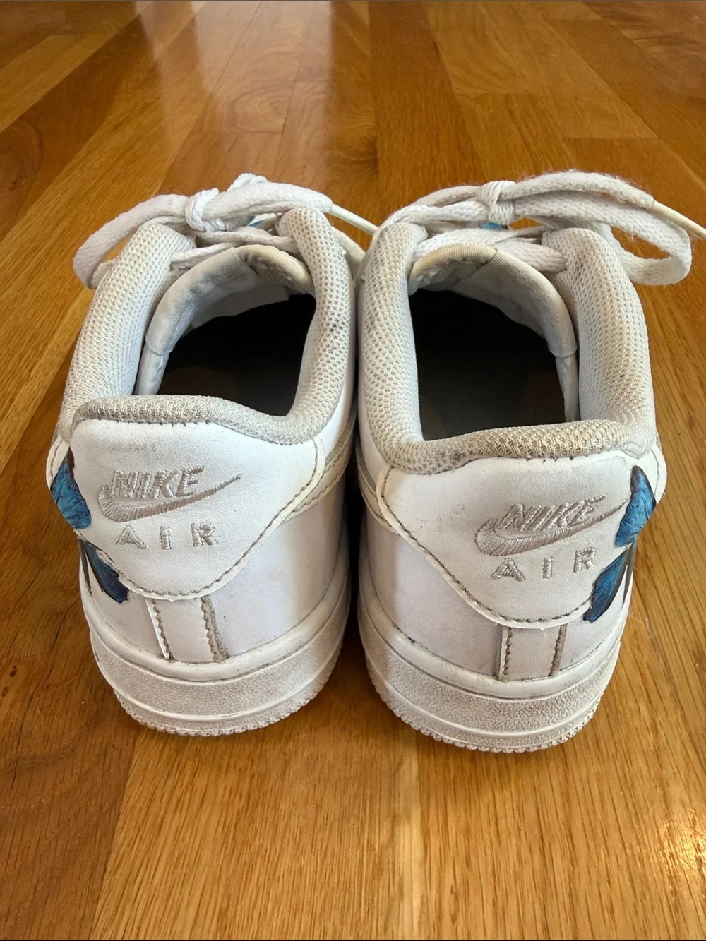 Nike Air Force One Sneakers with Blue Butterfly Accents